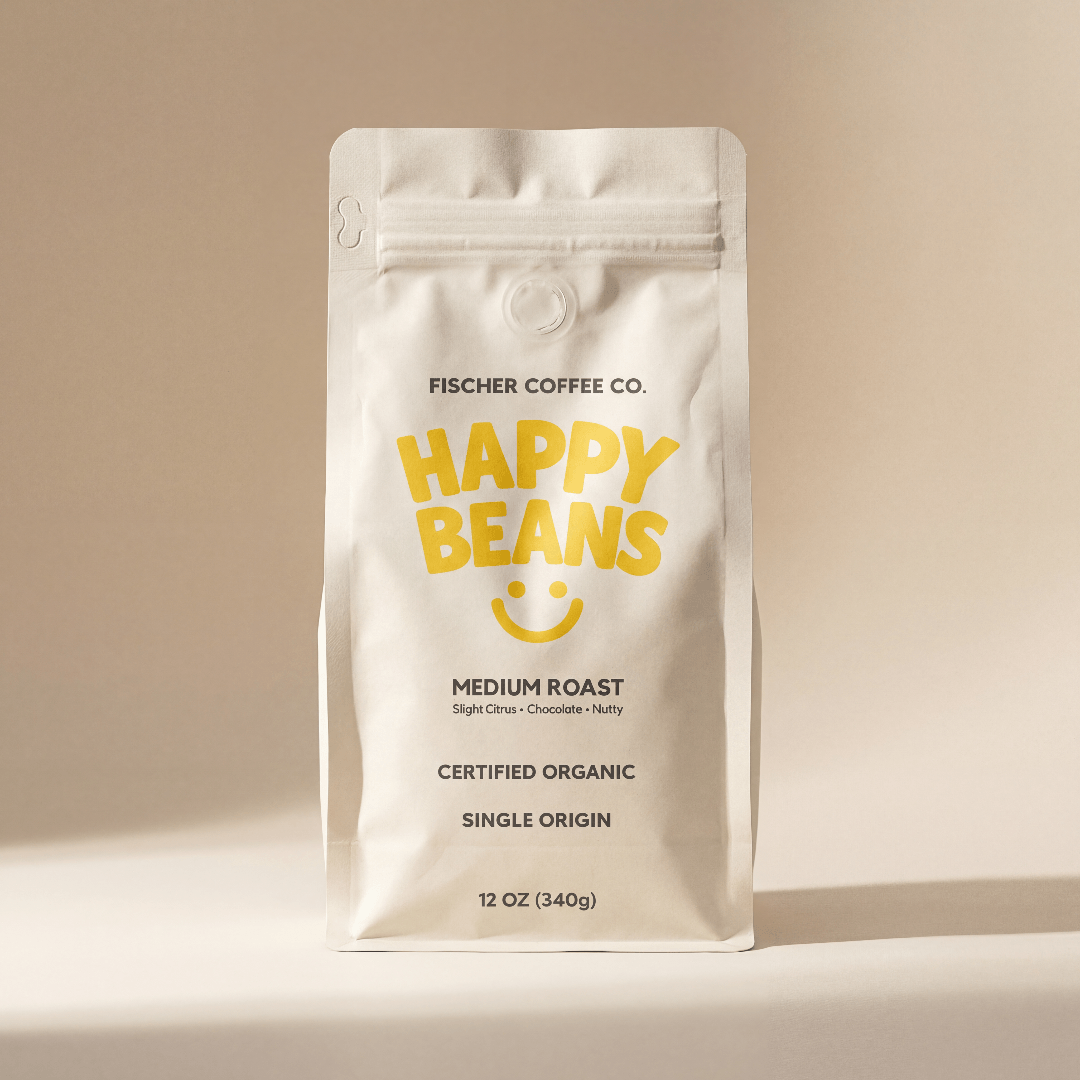 Fischer Coffee Co. Happy Beans coffee package on a beige background